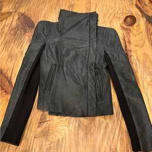 BCBGMaxAzria black leather moto jacket with standing collar and contrast sleeves